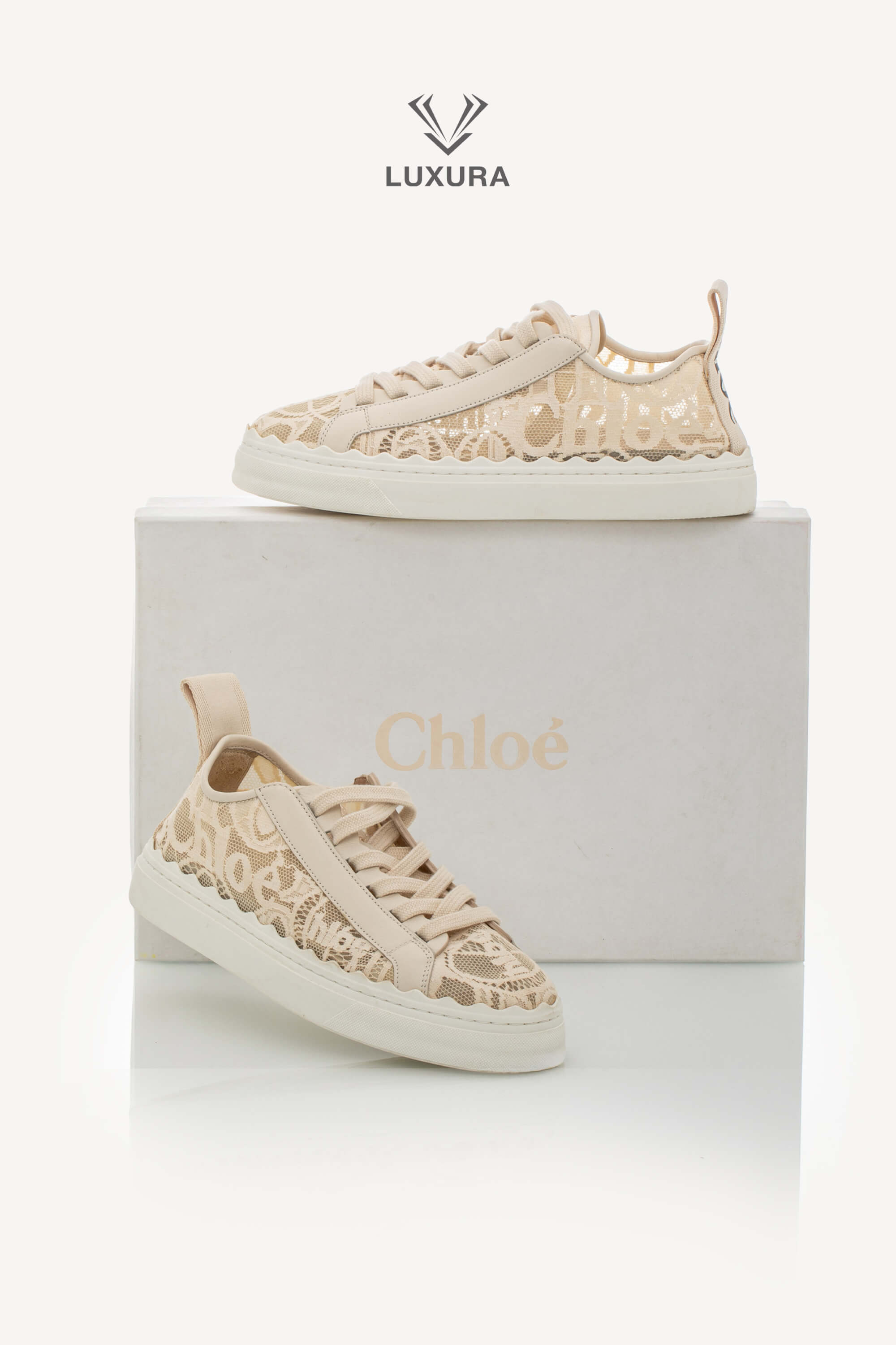<span style="font-size: 10px;letter-spacing: .15em">IN TRENDING</span><br> <strong>CHLOE</strong><br> <div style="margin-top:10px;font-size:16px">Lauren Lace Sneakers in Beige 38</div><br> - Image 2